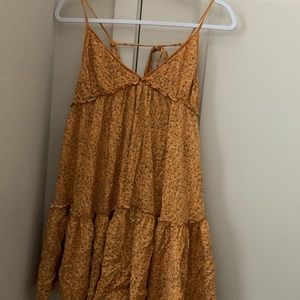 flowy burnt orange flower patterned dress